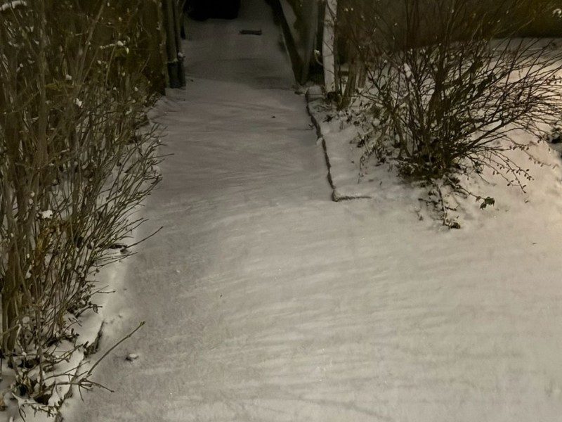 Residential walkway snow shoveling — before